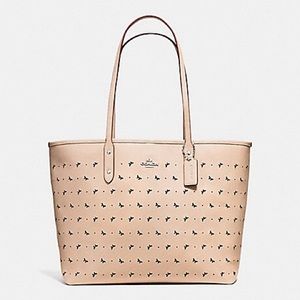 COACH bag with butterfly cuts